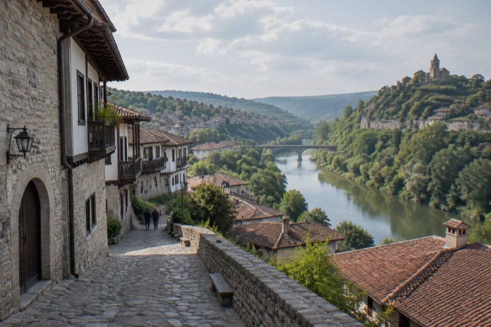 A historic stone building on a cobbled street in the Veliko Tarnovo old town