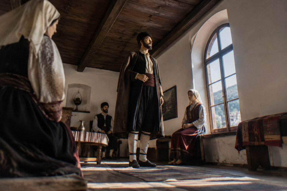 Interior of a visitor centre with historical wax figures in period dress