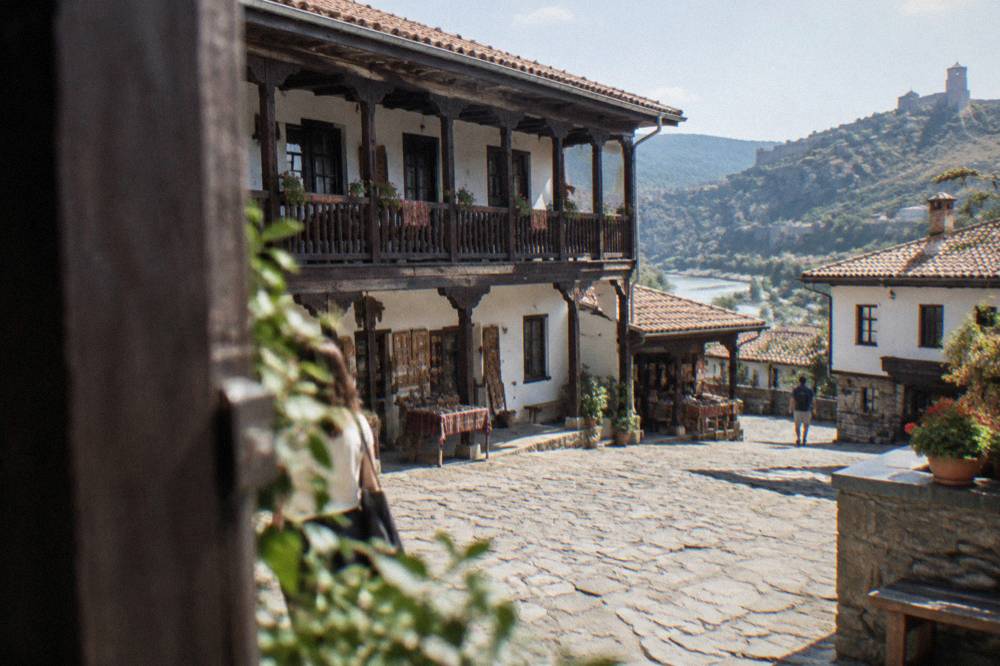 A cobbled market street with small craft workshops in an old Bulgarian town