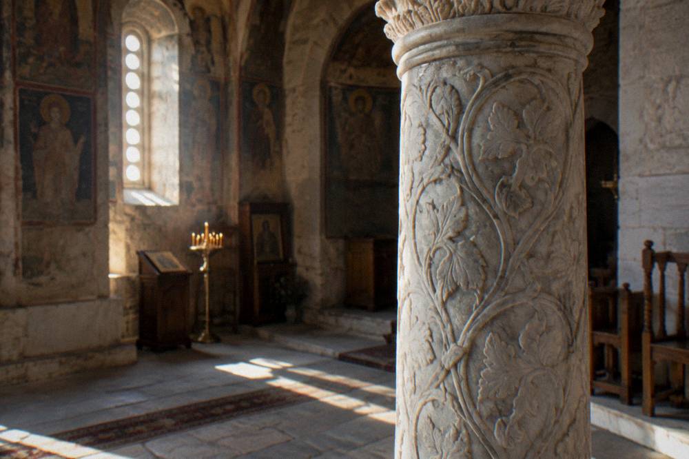 Inscribed marble column photographed up close in a church interior