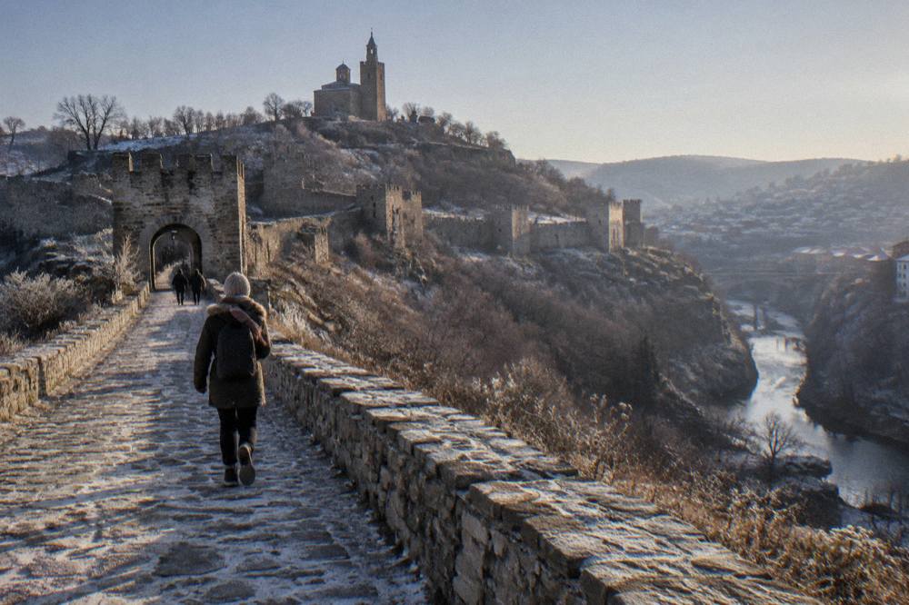The walled summit of Tsarevets in low winter light above Veliko Tarnovo
