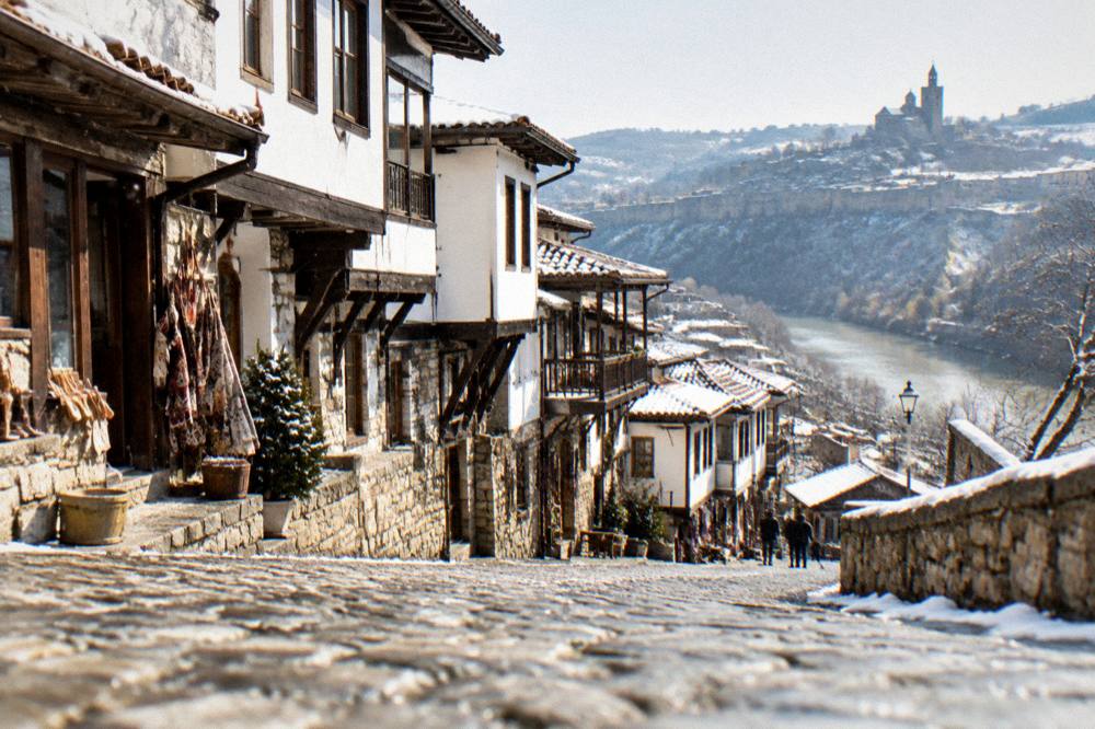 A historic stone street with small shops and workshops in an old town