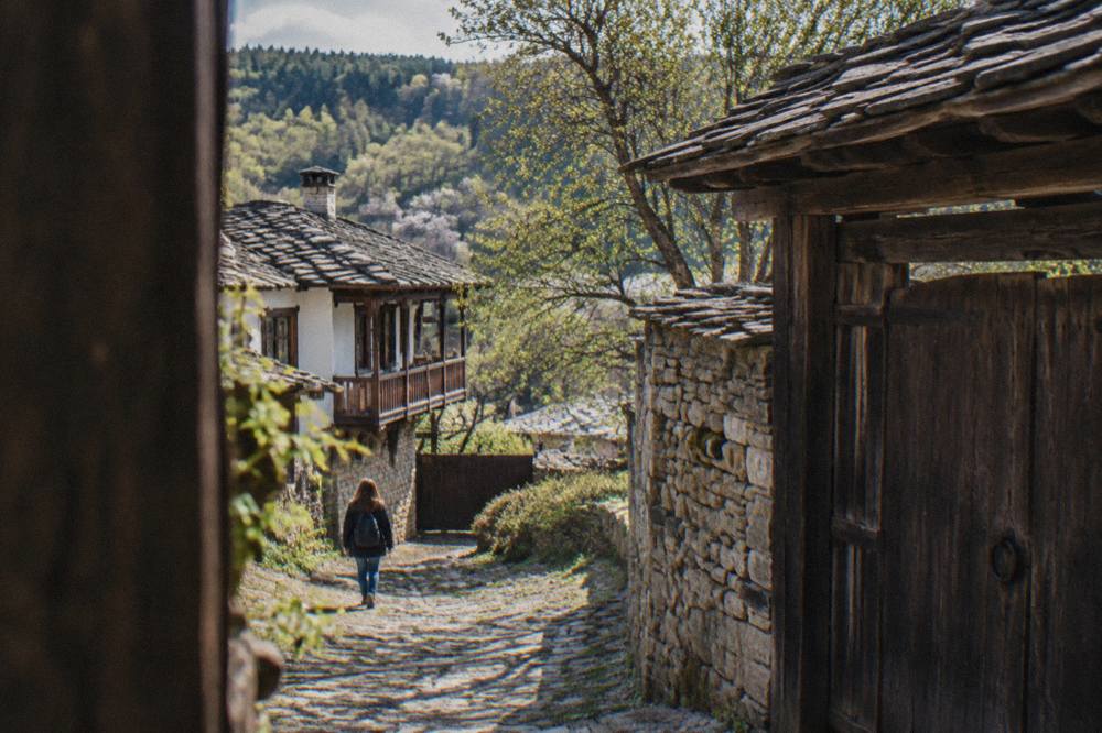 Wooden gate and stone wall of an old house in Bozhentsi