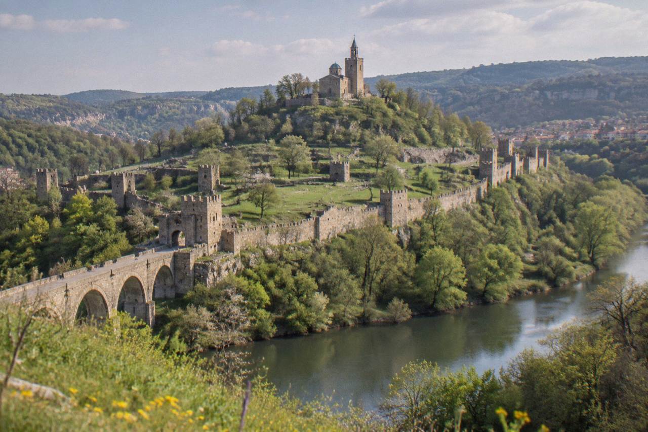 The walled hill of Tsarevets Fortress rising above the Yantra river at Veliko Tarnovo