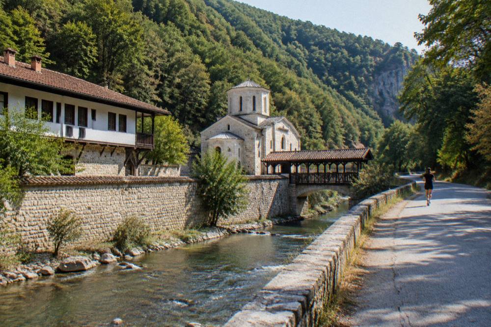 A country road winding through wooded hills in central northern Bulgaria