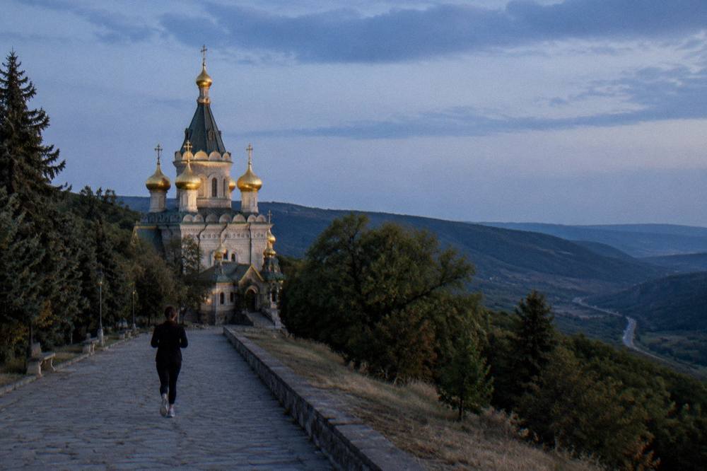 Rolling hills south of the Shipka pass with a road disappearing into the valley