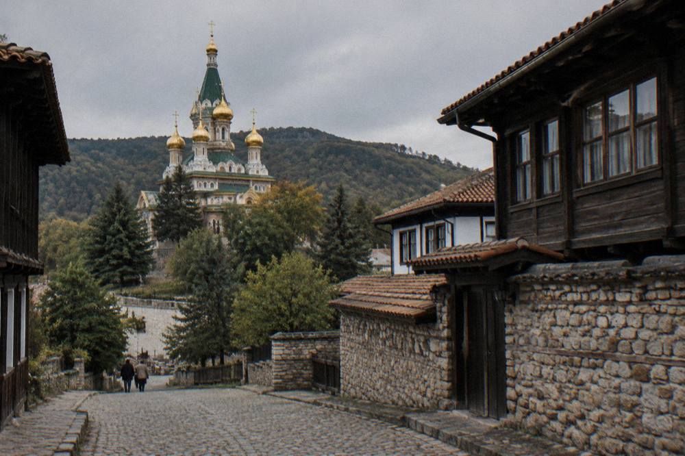 Cobbled street of old wooden houses in a small revival-era Bulgarian town