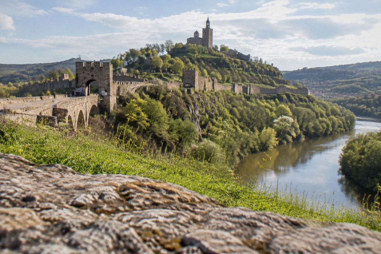 The walled hill of Tsarevets Fortress rising above the Yantra river in Veliko Tarnovo