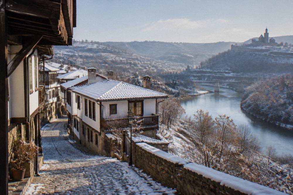 Morning light over the rooftops and Yantra river bend of Veliko Tarnovo