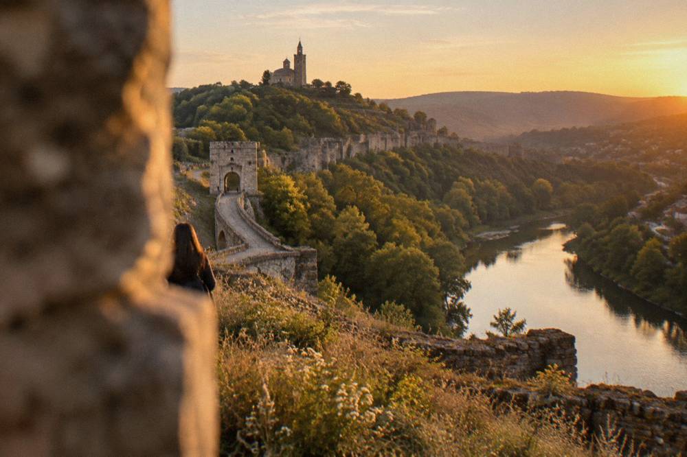 Tsarevets Fortress walls above the Yantra river at dusk