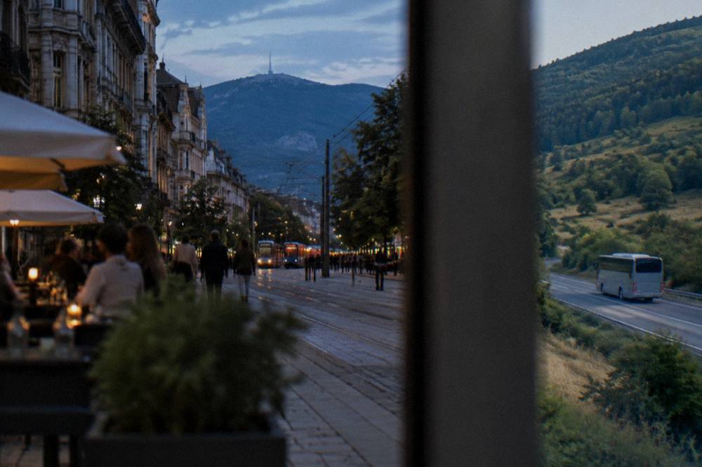 A long-distance coach on a road winding through green hills in northern Bulgaria
