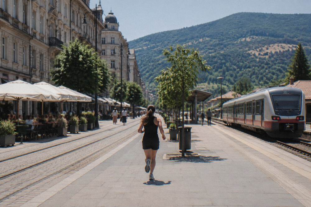A regional train waiting at a small station platform in central Bulgaria