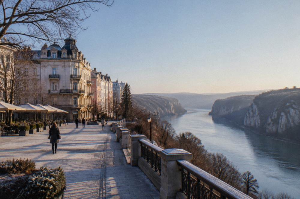 A deep forested gorge with a river running between tall limestone cliffs
